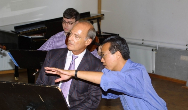 Prince Amyn Aga Khan with Yo-Yo Ma and members of the Silk Road Ensemble during their rehearsals at the Schloss Salzau in German